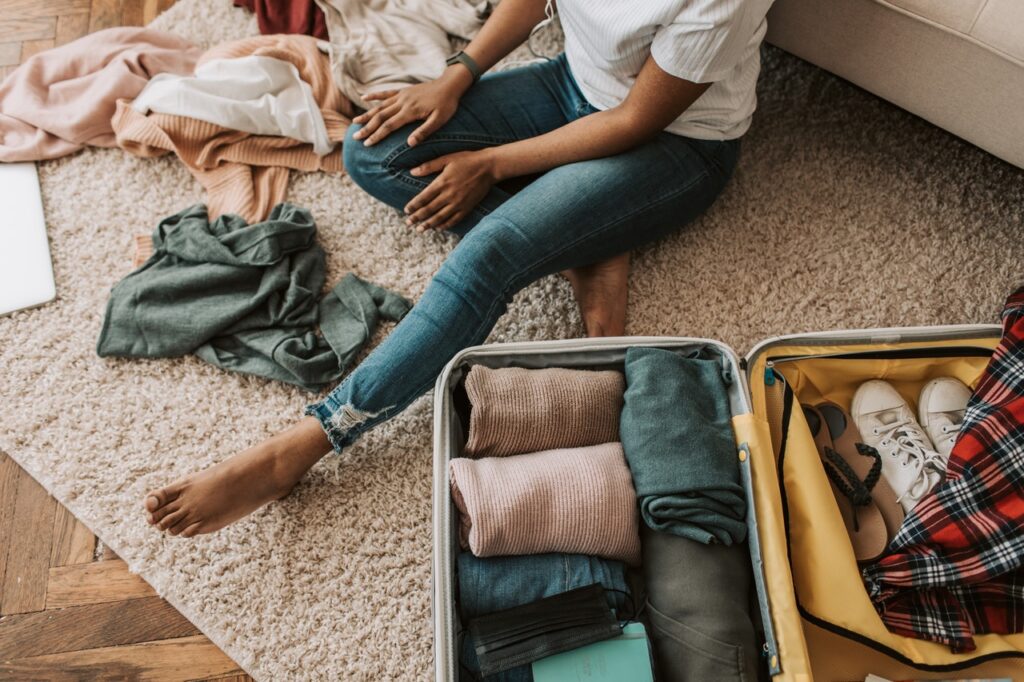 woman packing her suitcase