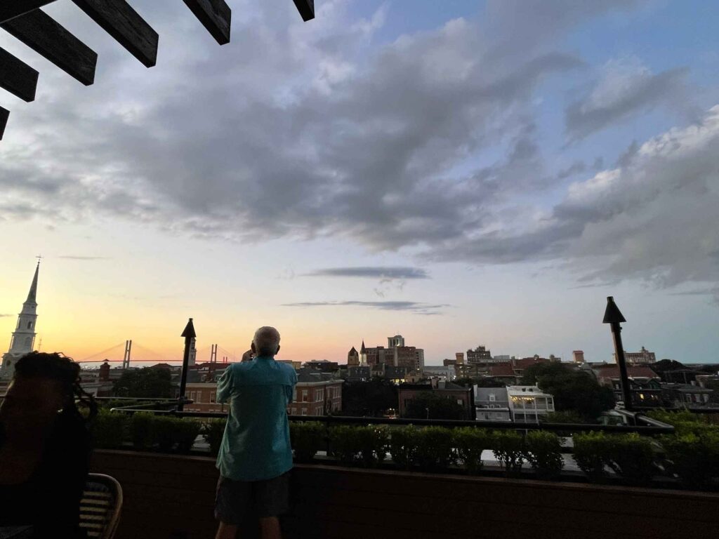 sunset view from a roof top bar in savannah, ga