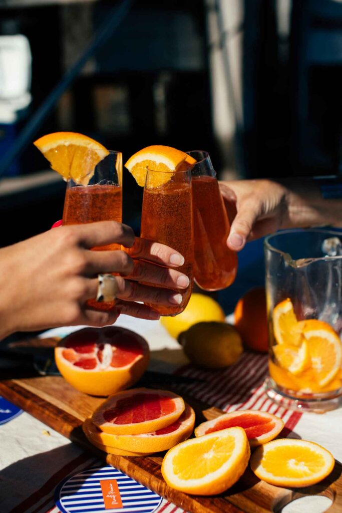 no host cocktail party tips picture of glasses filled with red beverages