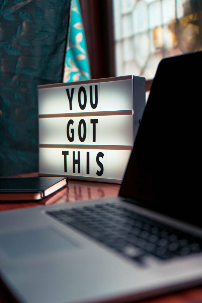 a sign on a desk that says you got this