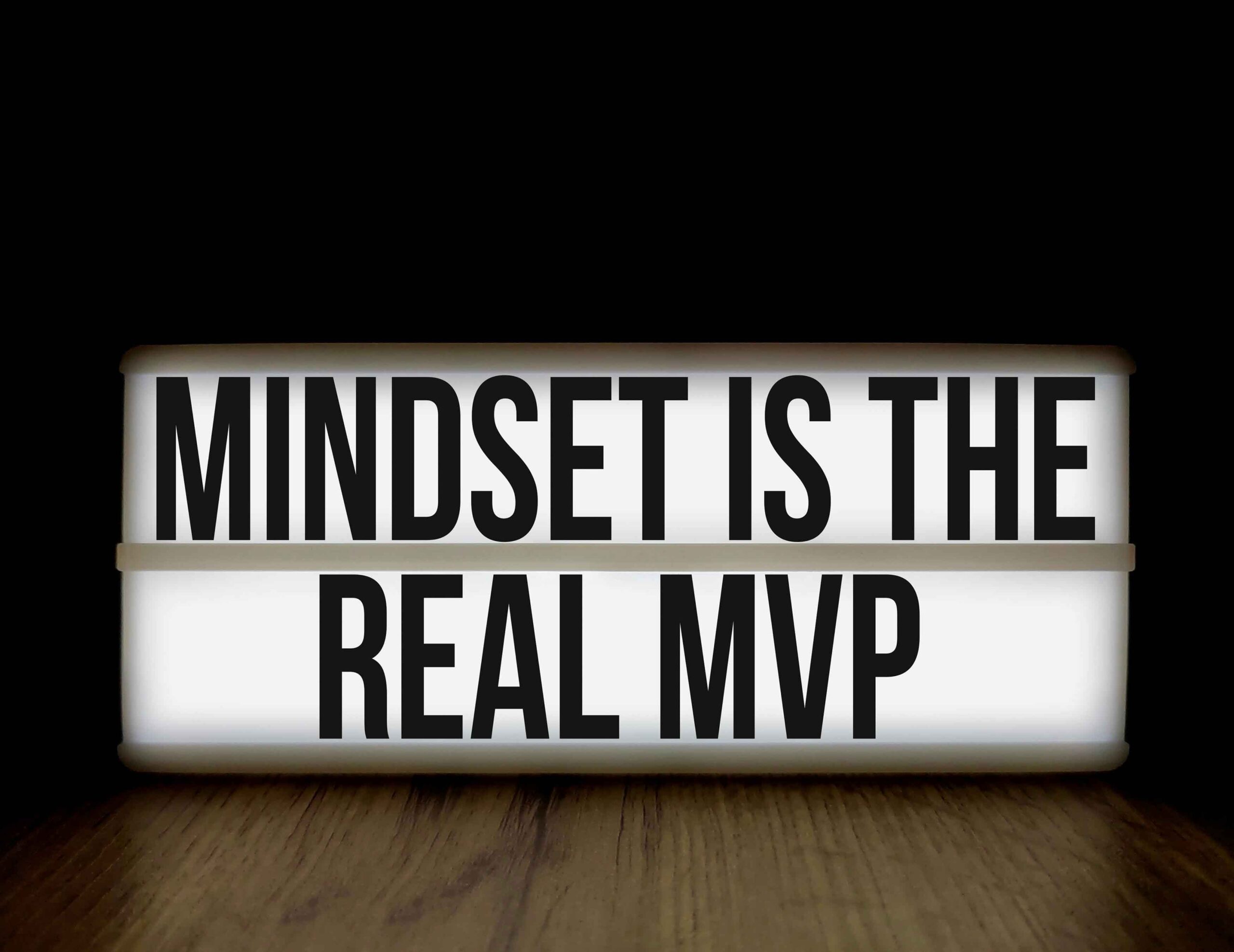 sign that says "mindset is the real MVP". mindset shifts to thrive in business