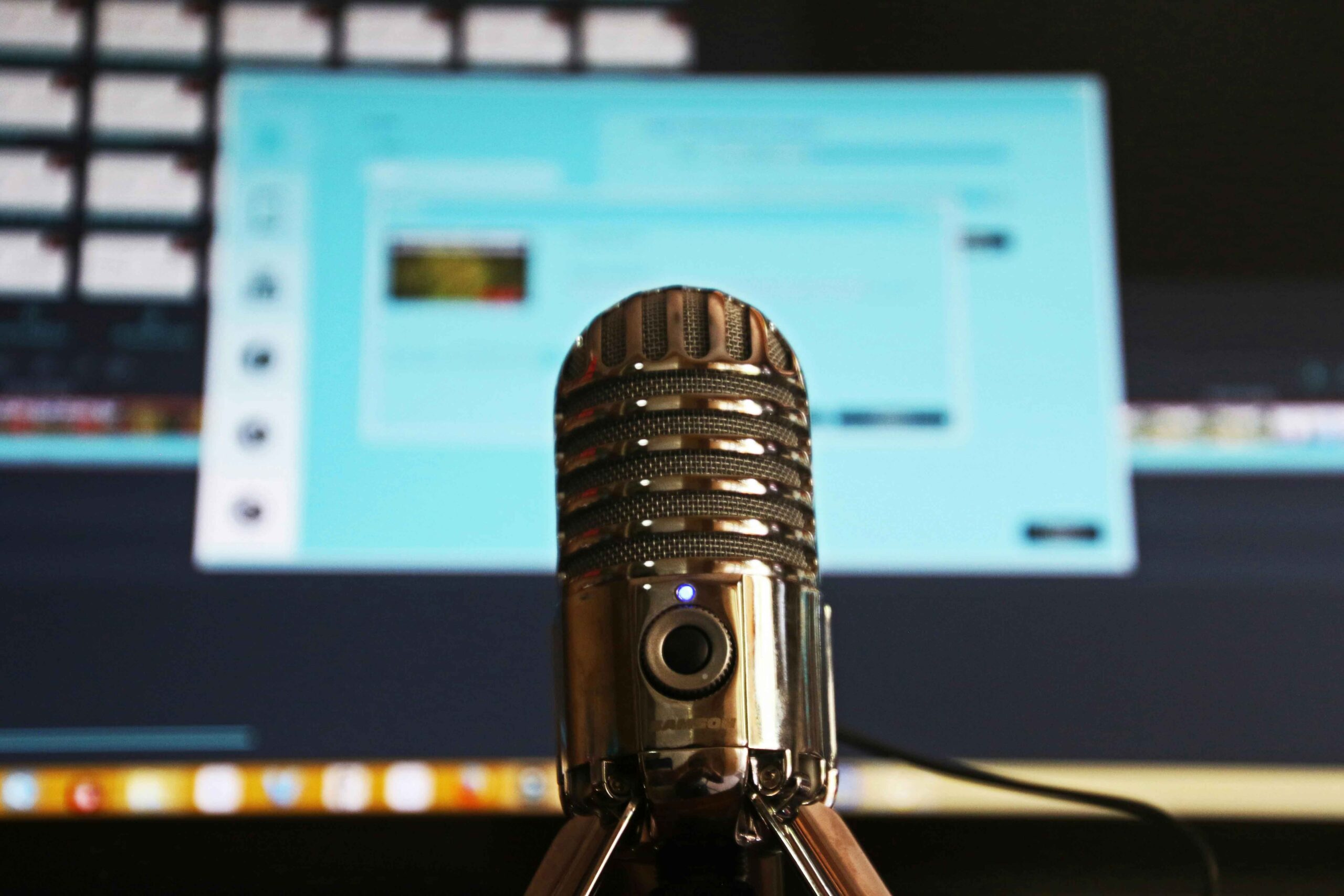 How I Built This Podcast for Entrepreneurs - microphone infront of a computer screen